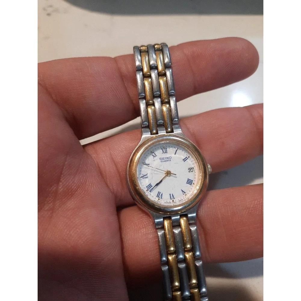 Seiko Watch Women 24mm White Dial Two Tone Date Round 7N82-6B29